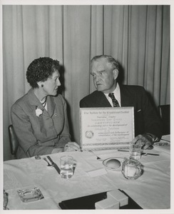 Bruce Barton and woman with award