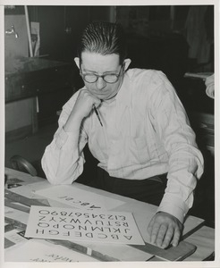 William Murphy copying the alphabet