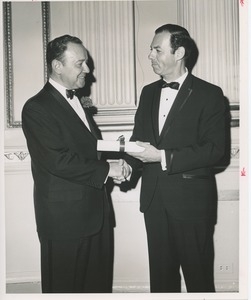 Unidentified men in tuxedos at an ICD event