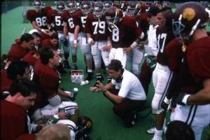 Head Football Coach Mike Delong talking to the Springfield College Football team, 1984-1985