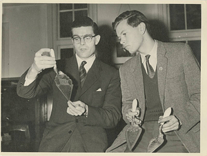 Ernest Peach and Roy Coddington look at trowels