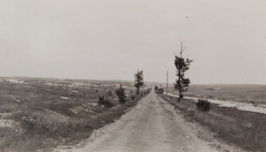 View of empty fields and the road to Tahure