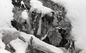 Ice formations, snow, in stream