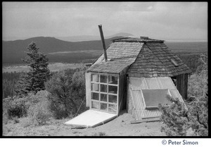 Commune building with dome roof, built on a hillside overlooking the valley, Lama Foundation