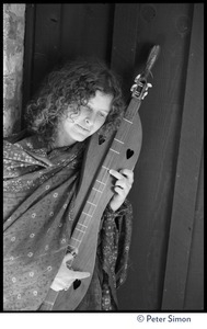 Usha (Cathy Brown): half-length portrait posed with a dulcimer