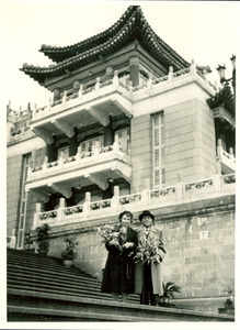 W. E. B. Du Bois and Shirley Graham Du Bois on stairs of guest house, Chang-tu, 1959