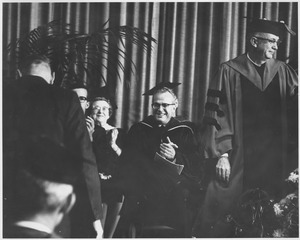 President John W. Lederle with unidentified administrators at the Centennial Honors Day convocation