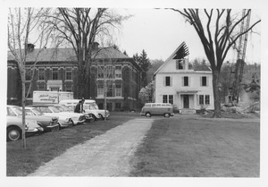 Demolition of the Mathematics Building near Fernald Hall; view from the front with Insectary gone and Volkswagen microbus parked in front