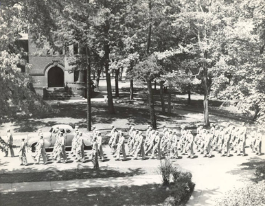 Army Air Corps trainees marching down Hickory Street (June 1943)