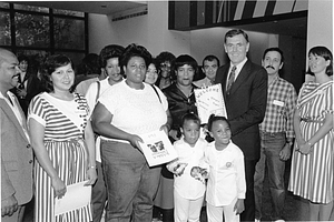 Mayor Raymond L. Flynn posing with a group at a literacy event