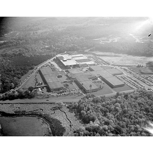 Suburban location of industrial buildings, some new construction, unidentified