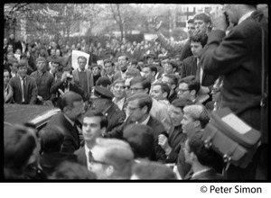 Robert McNamara (emerging from a car) confronted by antiwar students at Harvard University