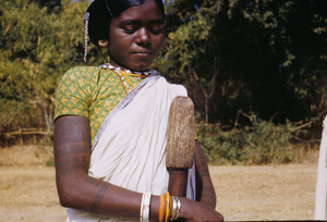 Tatoos and jewelry worn by a young Munda woman