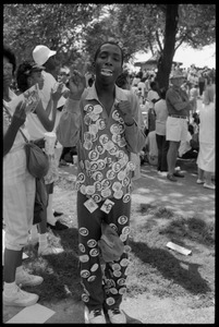 Man decked out with dozens of buttons from the 25th Anniversary of the March on Washington