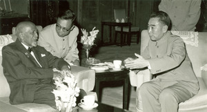 W. E. B. Du Bois in discussion with Zhou Enlai and unidentified official