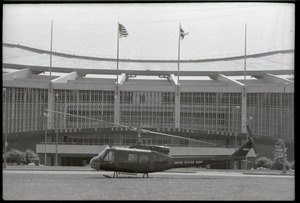 May Day concert and demonstrations: army Huey helicopter on ground in front of Robert F. Kennedy Stadium