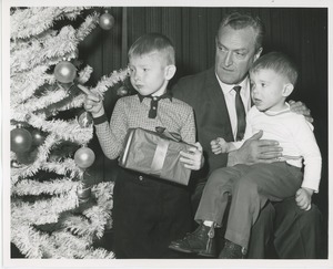 Ed Taylor and children admiring Christmas tree
