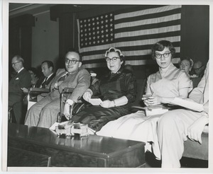 Clients seated on stage at Institute Day