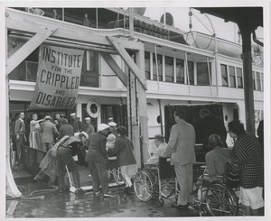 Wheelchair users board ship for annual boat ride