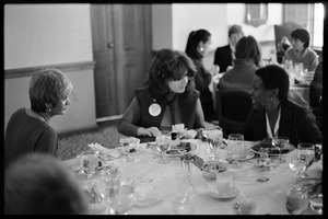 Meline Kasparian, Lisa Bskin, and Esther Terry (l. to r.) seated for lunch at Frances Crowe's party