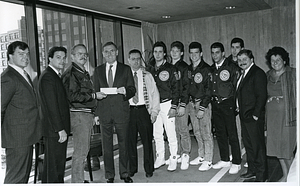 Mayor Raymond L. Flynn with unidentified members of the Greater Boston Babe Ruth Baseball Champs of 1986 and others