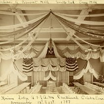 Interior of Town Hall, south end, decorated for Hiram Lodge Centennial
