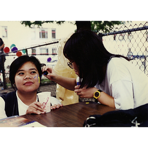 Face painting at Recreation Day fair