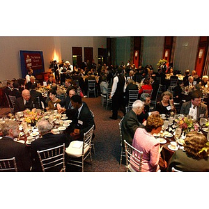 Guests sit around tables at the National Council Dinner