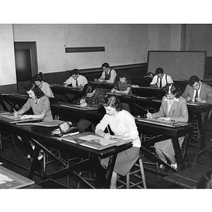 Students in a mechanical engineering drawing class