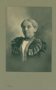Head-and-shoulders studio portrait of Caroline Hood, facing front, location unknown, undated