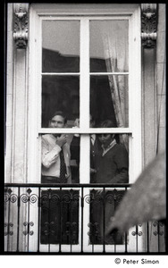 People seen through the windows of the University Placement Office, Boston University: students opposing on-campus recruiting by Dow Chemical Co.
