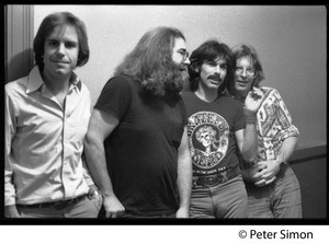 Grateful Dead backstage (left to right): Bob Weir, Jerry Garcia, Mickey Hart, and Phil Lesh