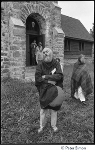 Ram Dass chanting outside the Reverend Preserved Smith Memorial Chapel, as attendees file out wearing blankets, Rowe Center spiritual retreat