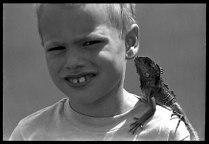 Stan Craig, 7, of Narrangansett, shows his iguana (George) that is six months old