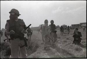 Antiwar demonstration at Fort Dix, N.J.: military police with gas masks