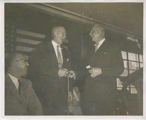 Unidentified men on stage at Institute Day