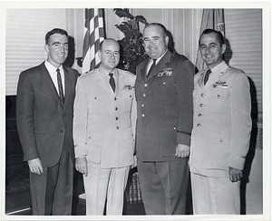 Charles W. Sweeney with unidentified men