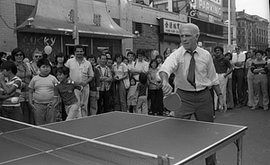 Mayor Kevin White plays table tennis at the 1979 August Moon Festival