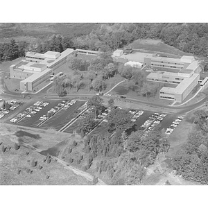 Suburban location of industrial buildings, some new construction, unidentified