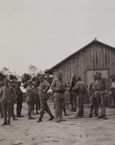 Soldiers standing in front of a building, hand grenade station near Châlons