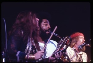 Janis Joplin, performing at Woodstock, with Cornelius 'Snooky' Flowers (bass saxophone) and Terry Clements (saxophone)