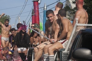 Parade marchers in skimpy outfits : Provincetown Carnival parade