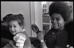 Herbie Hancock with daughter Jessica in lap - Digital Commonwealth