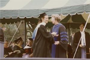 President Alice F. Emerson Grants Diploma II.