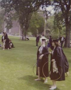 1961 Graduates Holding Hoops.