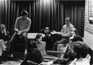 Faculty-student-alumni anti-war discussion group in Mark Hopkins House, 1969