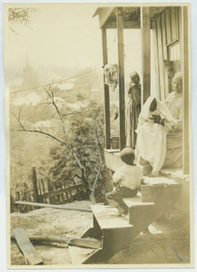 Black family on their porch in Vicksburg, Mississippi