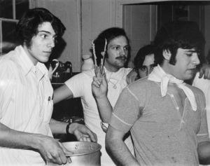 Members of Suffolk University's Tau Kappa Epsilon chapter in a kitchen, 1974