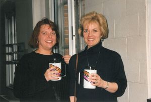 Suffolk University Law School students pose with Dunkin Donuts mugs