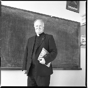 Fr. (Monsignor) Denis Faul, human rights activist, mediator in the Hunger Strike, parish priest in Co. Tyrone, pictured in his classroom